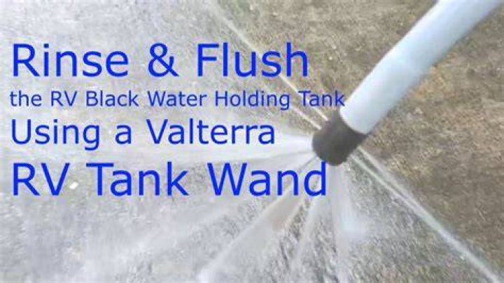 Can a flush hose cause a black water tank to overflow?