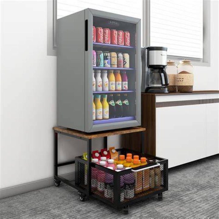 Can a fridge stand next to a stove?
