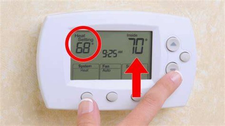 How do I change my thermostat from AC to heat?