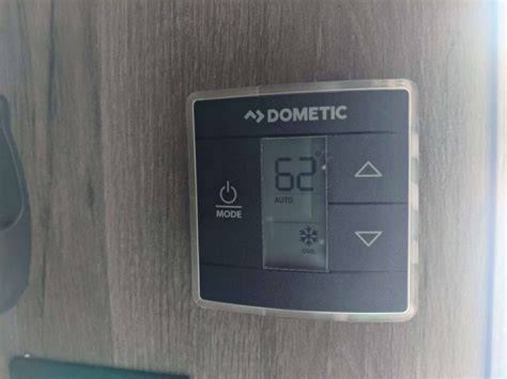 How do I get my Dometic thermostat to Fahrenheit?