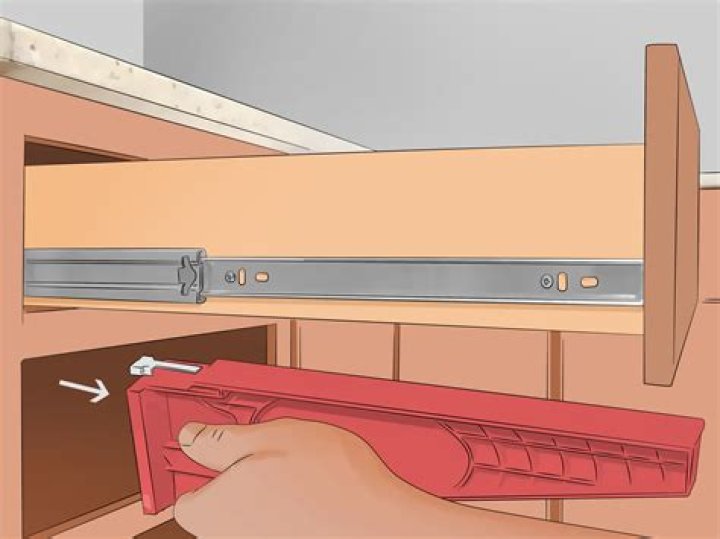 How do you get a dresser drawer off the rails?