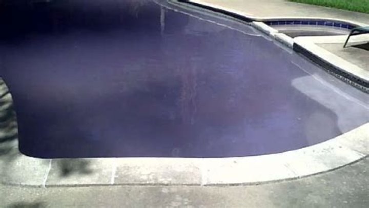 How do you remove purple stains from pool plaster?