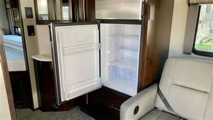 How do you reset a norcold camper refrigerator?