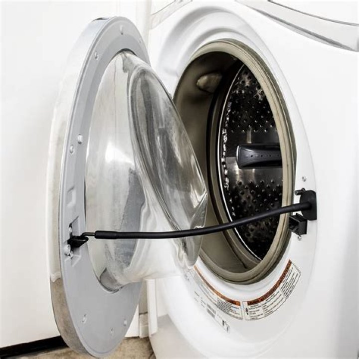 How do you unlock a Whirlpool front load washer door?